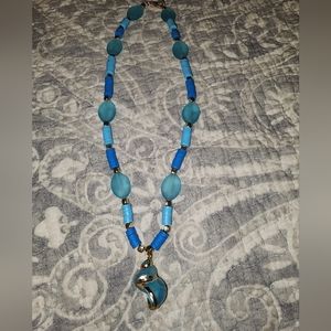 Blue and Gold seashell necklace with sea glass.